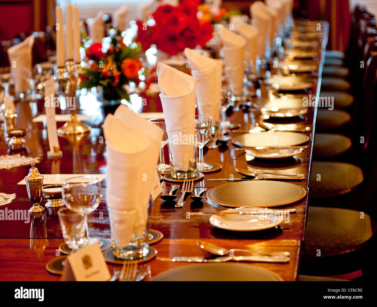 Table set for a banquet at Plantation House on the island of St Helena in the South Atlantic Ocean Stock Photo