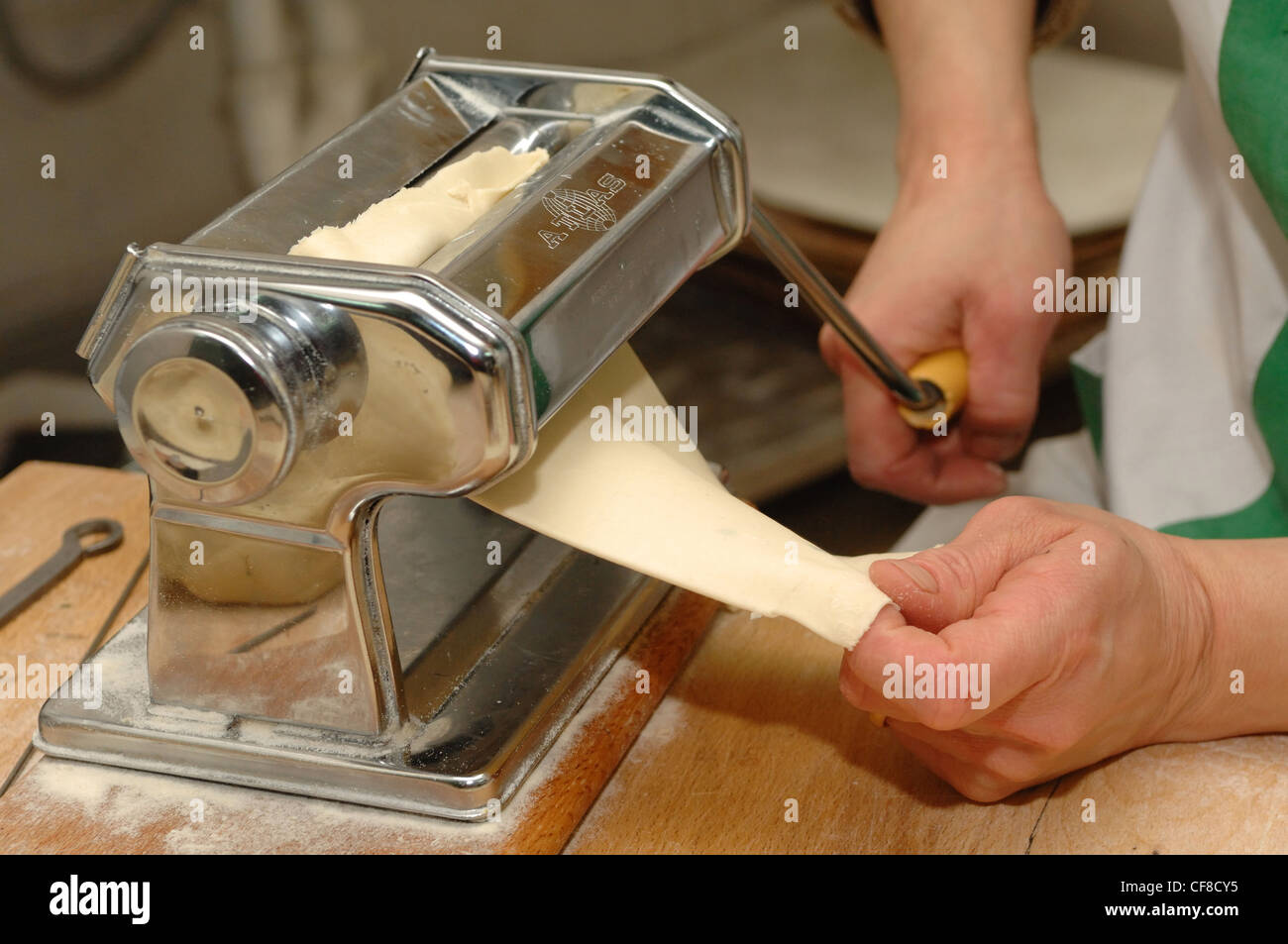 pasta machine pasta preparation hand made italian food basilicata region south italy Europe Stock Photo