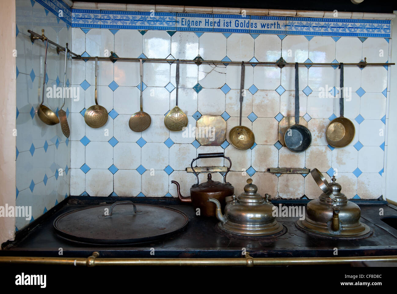 A traditional German kitchen stove used in the 19th century was preserved at the Herbstprinz at Jork, Altes Land, Lower Saxony Stock Photo