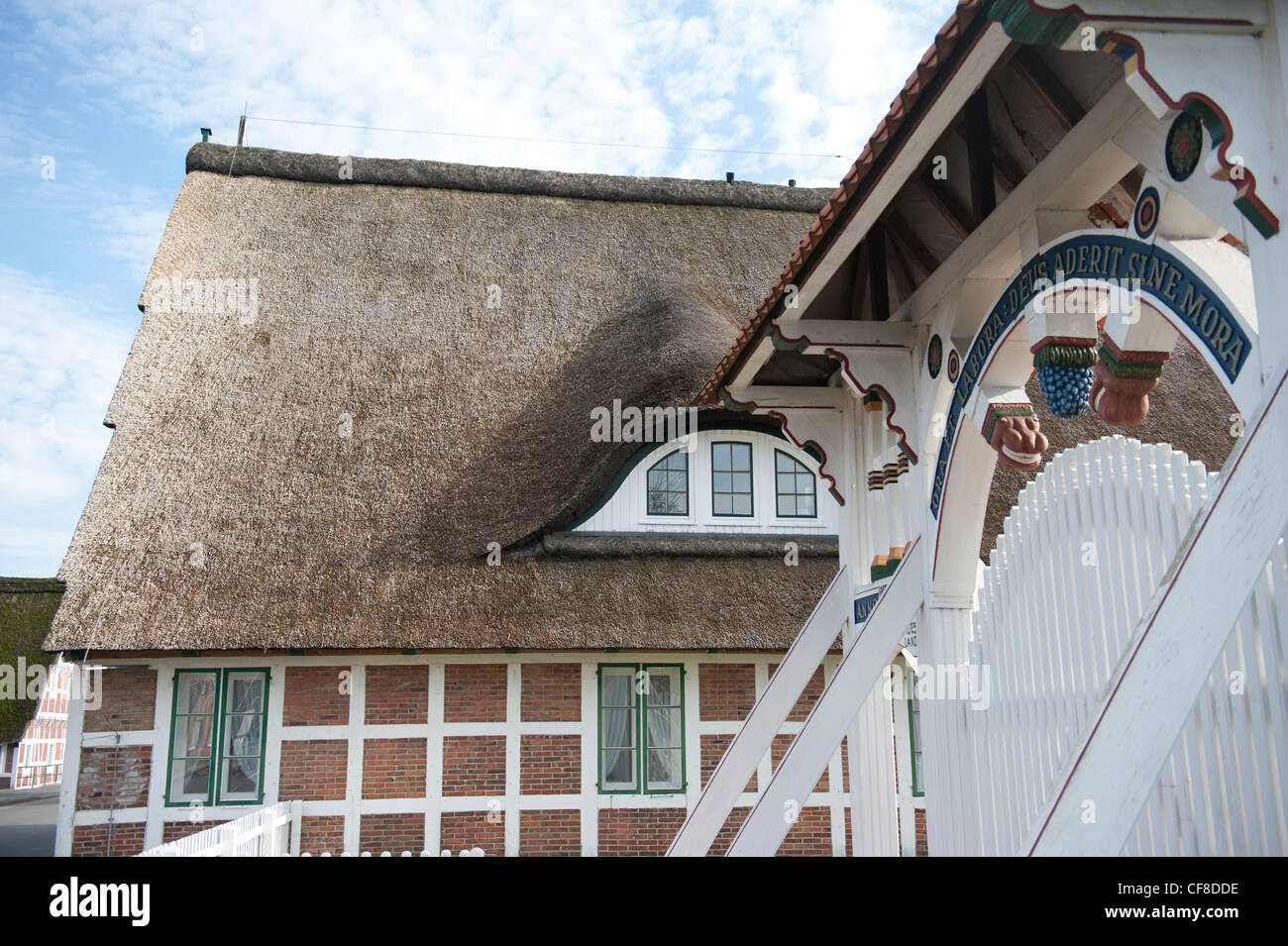 At Jork, the museum of the 'Altes Land' displays the region's rich heritage in a traditional farm house with white entrance gate Stock Photo