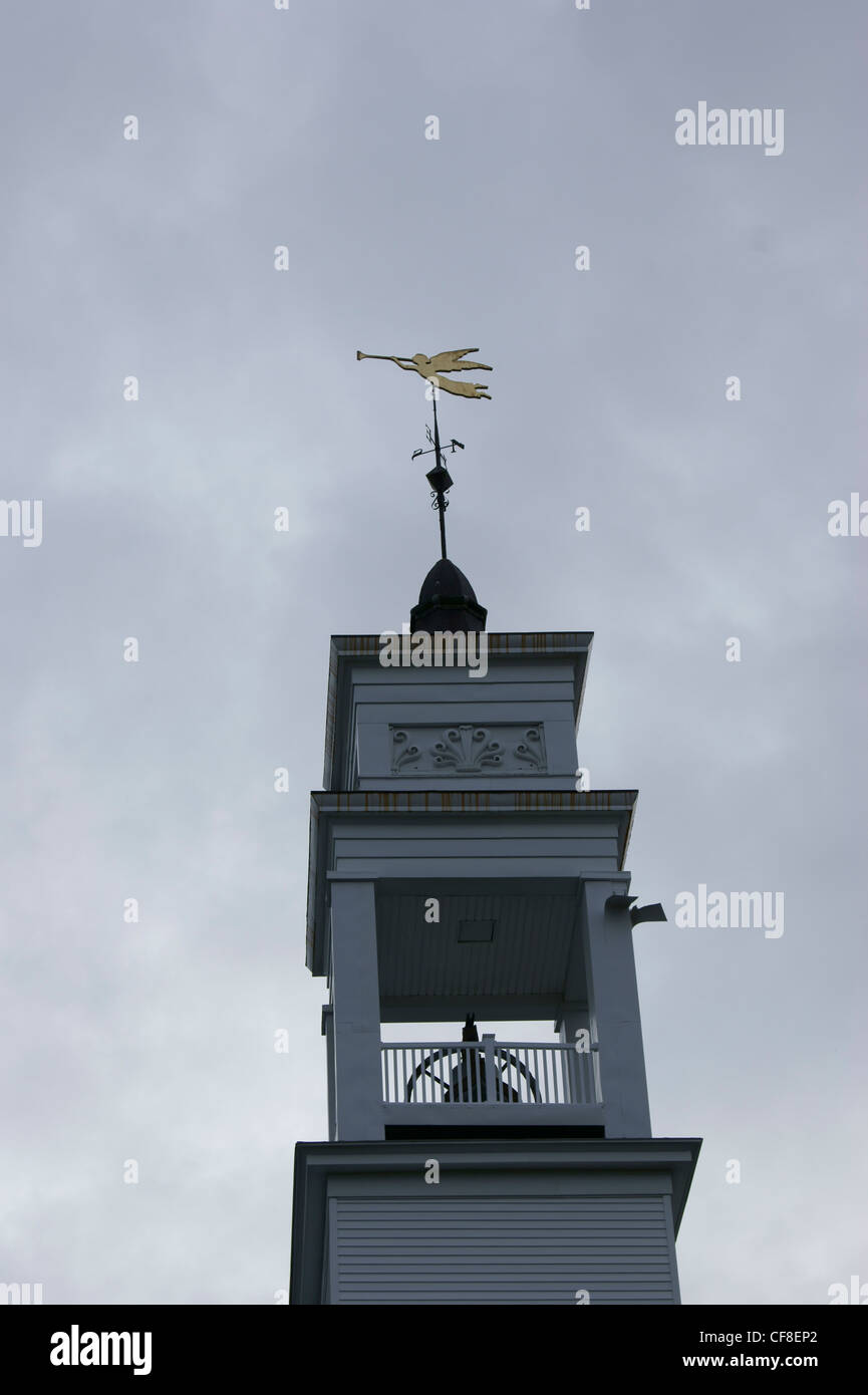 Golden angel Gabriel weather vane on a church bell tower, Belfast, Maine. Stock Photo