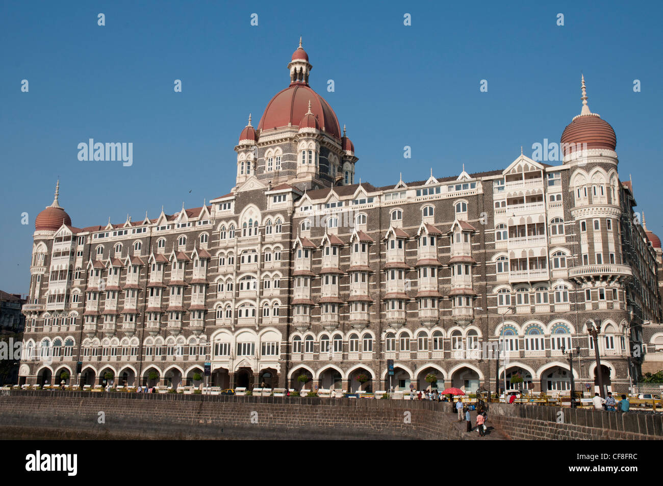 Taj Mahal Palace Hotel seen from the Gateway of India monument on the seafront at Mumbai Stock Photo