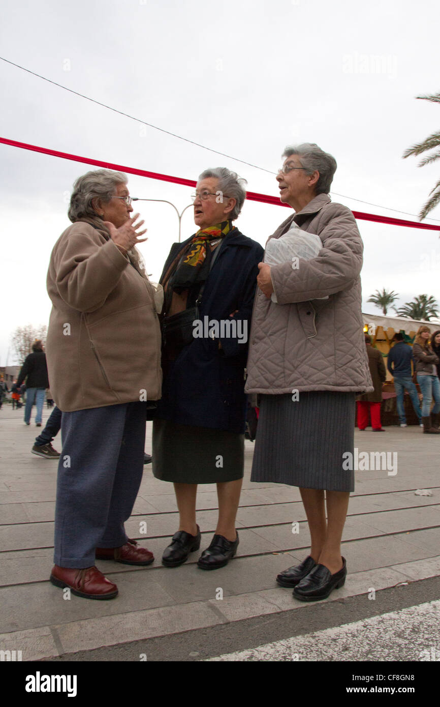 Three women elderly speaking in Mallorca Majorca Spain Stock Photo Alamy