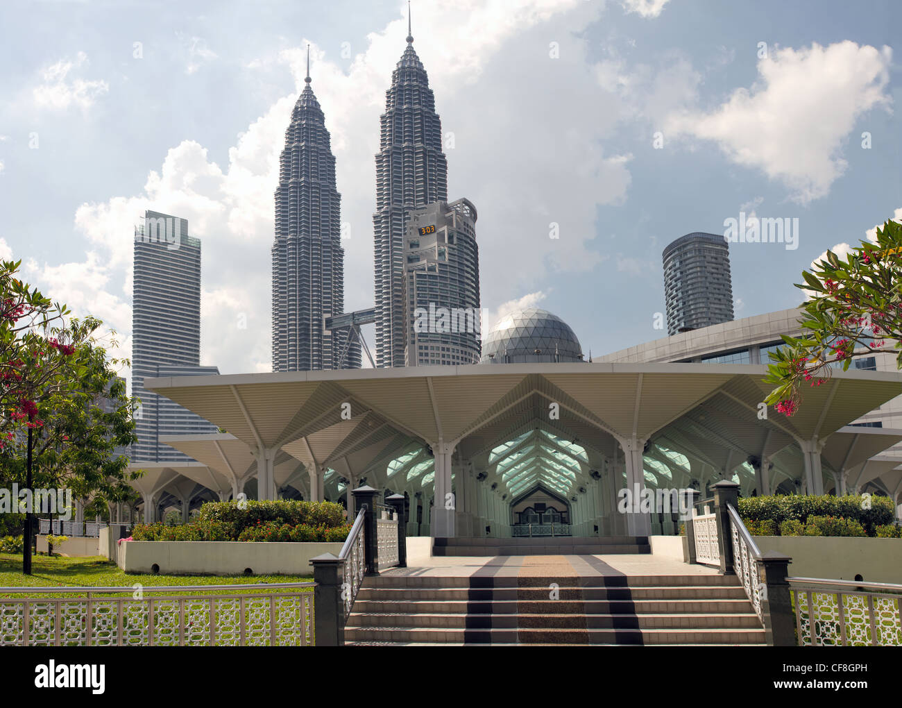 Masjid Asy-Syakirin Muslim Mosque in Kuala Lumpur City Center Park with Downtown Skyline Malaysia Stock Photo