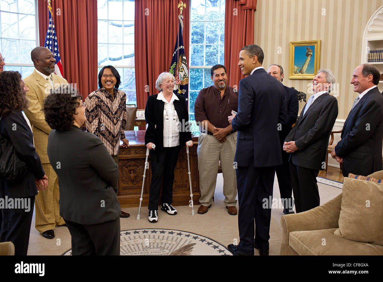 President Barack Obama meets with Goldman Environmental Prize winners in the Oval Office April 13, 2011 in Washington, DC. The Goldman Environmental Prize is a prize awarded annually to grassroots environmental activists, one from each of the world's six geographic regions. Stock Photo