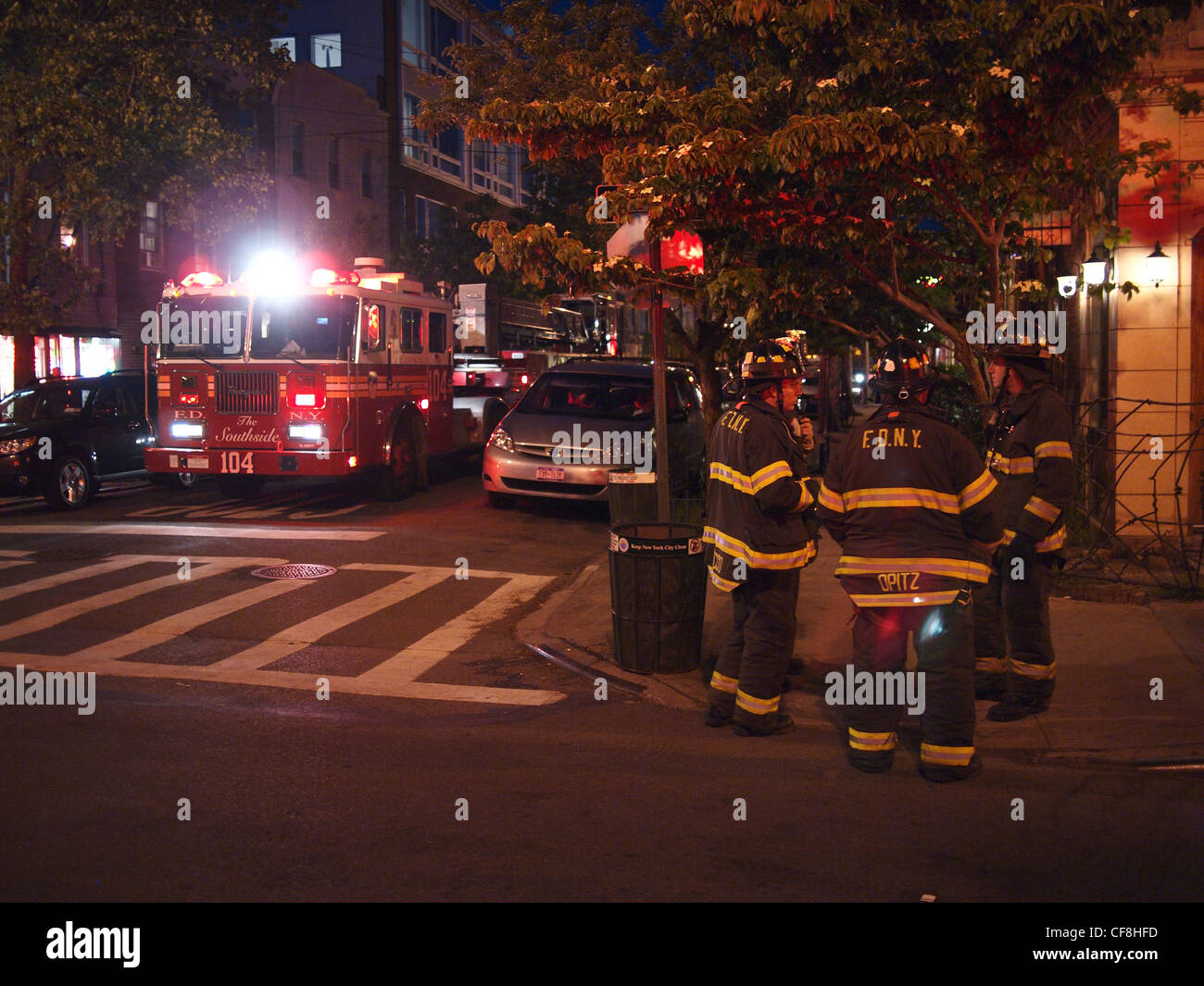 Firemen on street, Brooklyn, New York Stock Photo