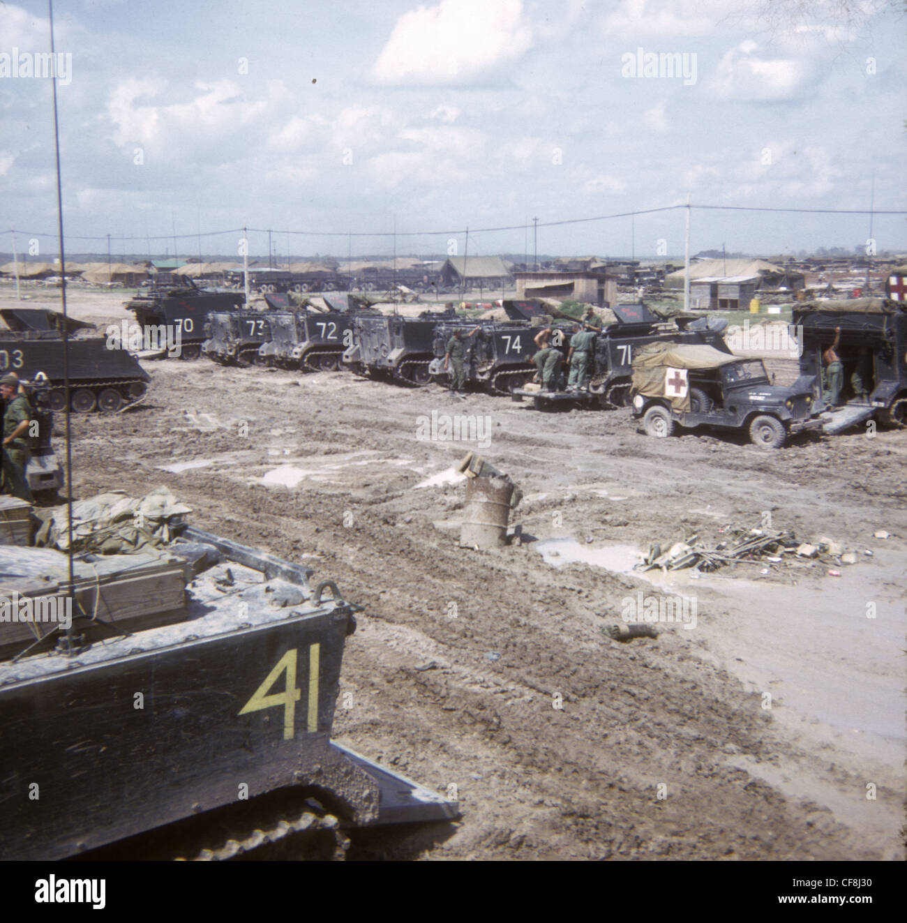 APCs parked at Cu Chi basecamp 1/5th (Mechanized) Infantry CU CHI VIETNAM War 1966 M113 armored personnel carriers 25th Infantry Stock Photo