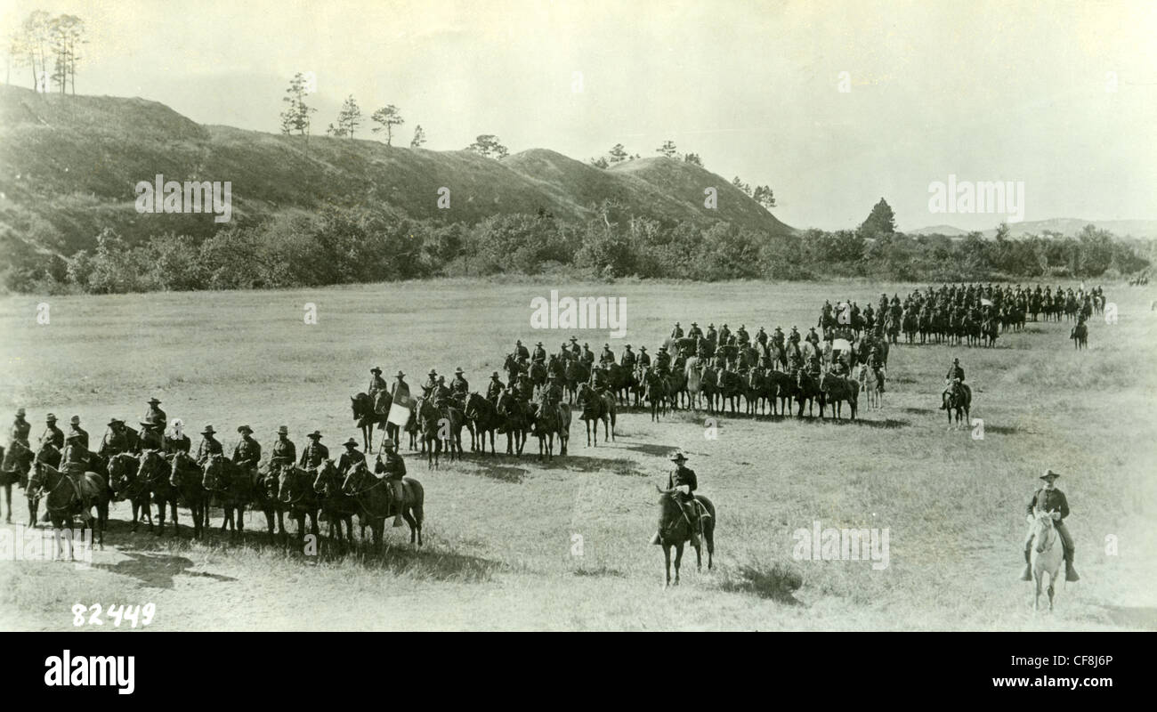 A squadron of the 9th US Cavalry stands on horses in formation at Fort Robinson, Nebraska in 1889 during the Indian Wars, black Stock Photo