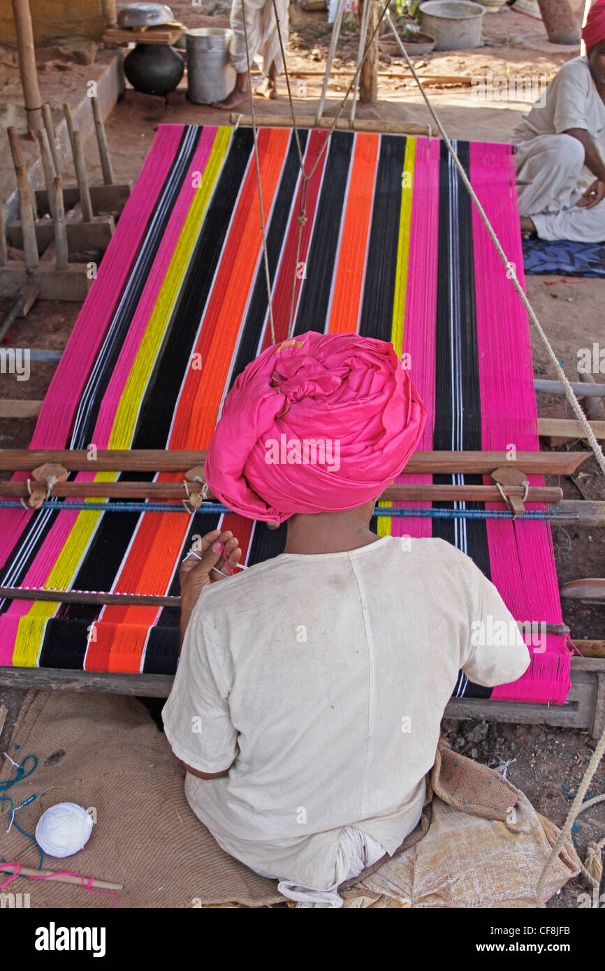 Man Making Ghongadi, desi blanket from sheep wool, Hand-made Multicolor