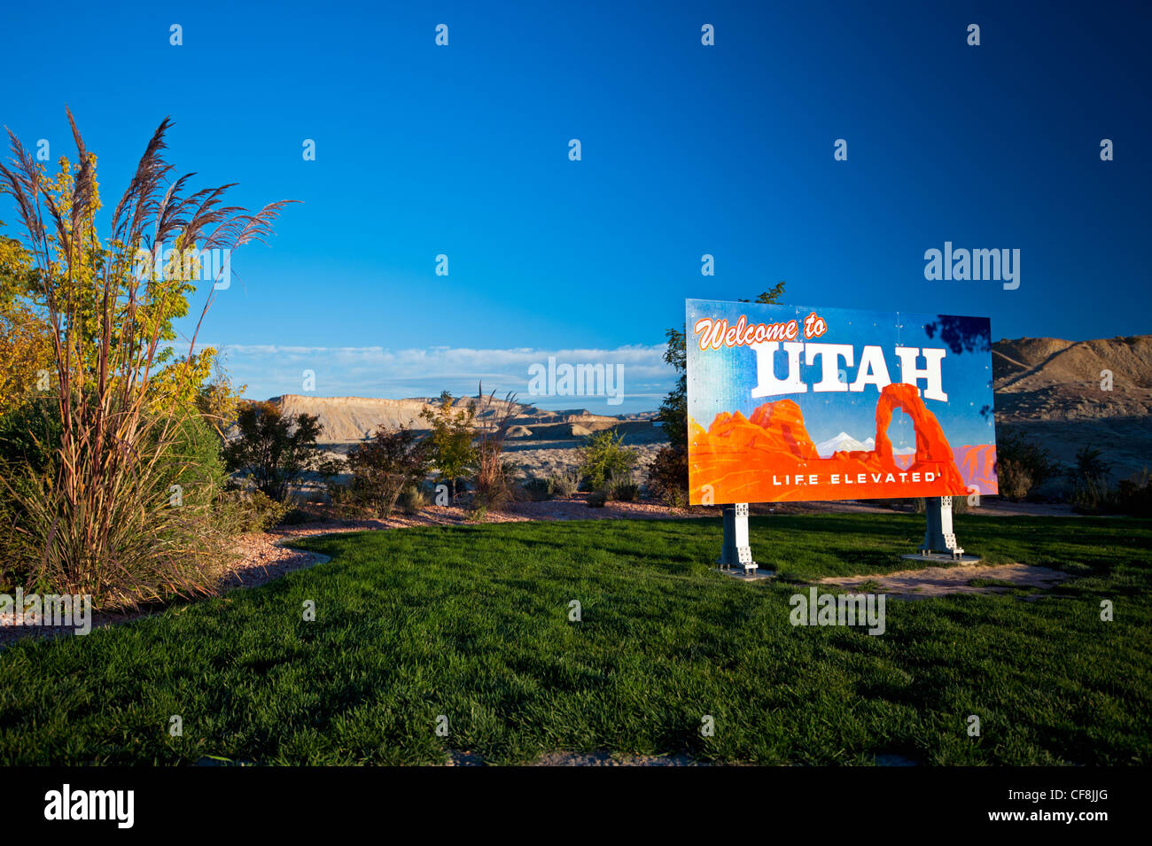 A welcome to Utah sign with matching landscape (room for copy) Stock Photo