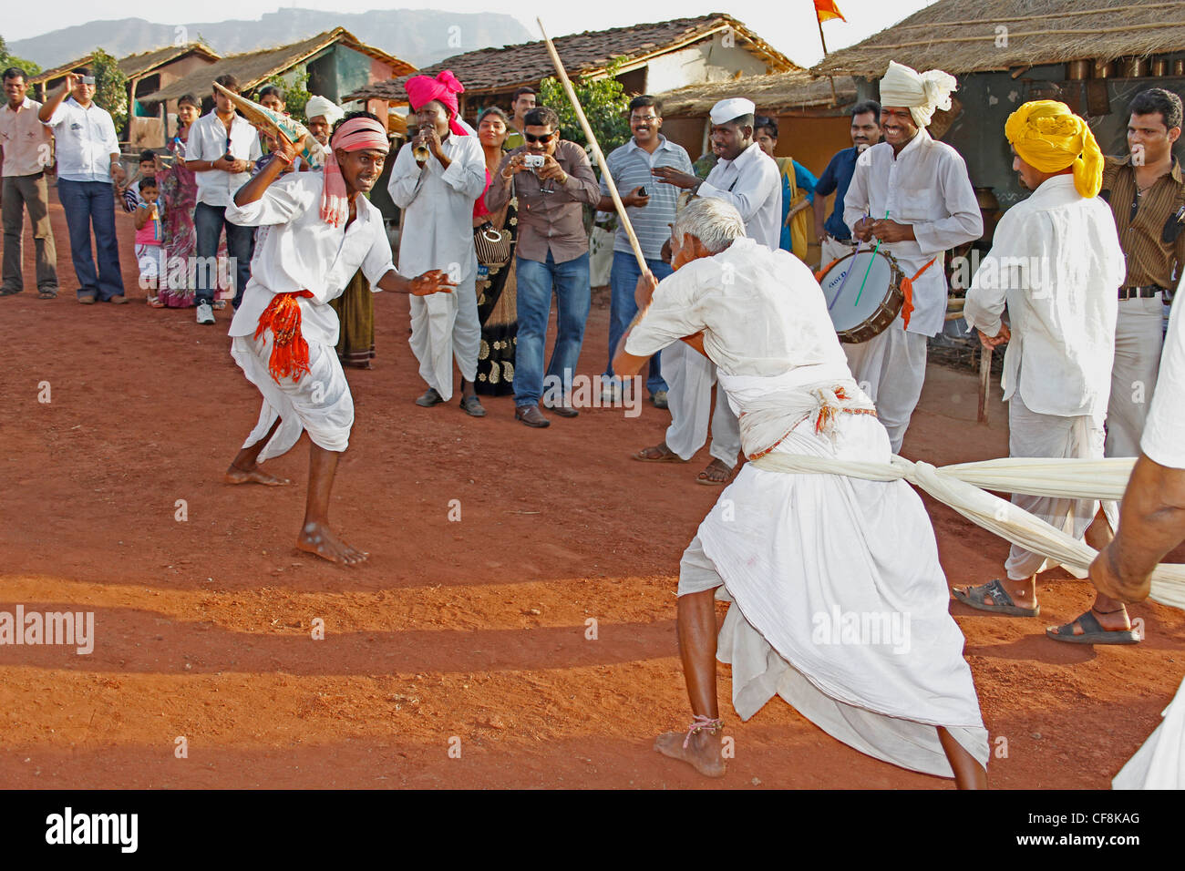 Man with lathi hires stock photography and images Alamy