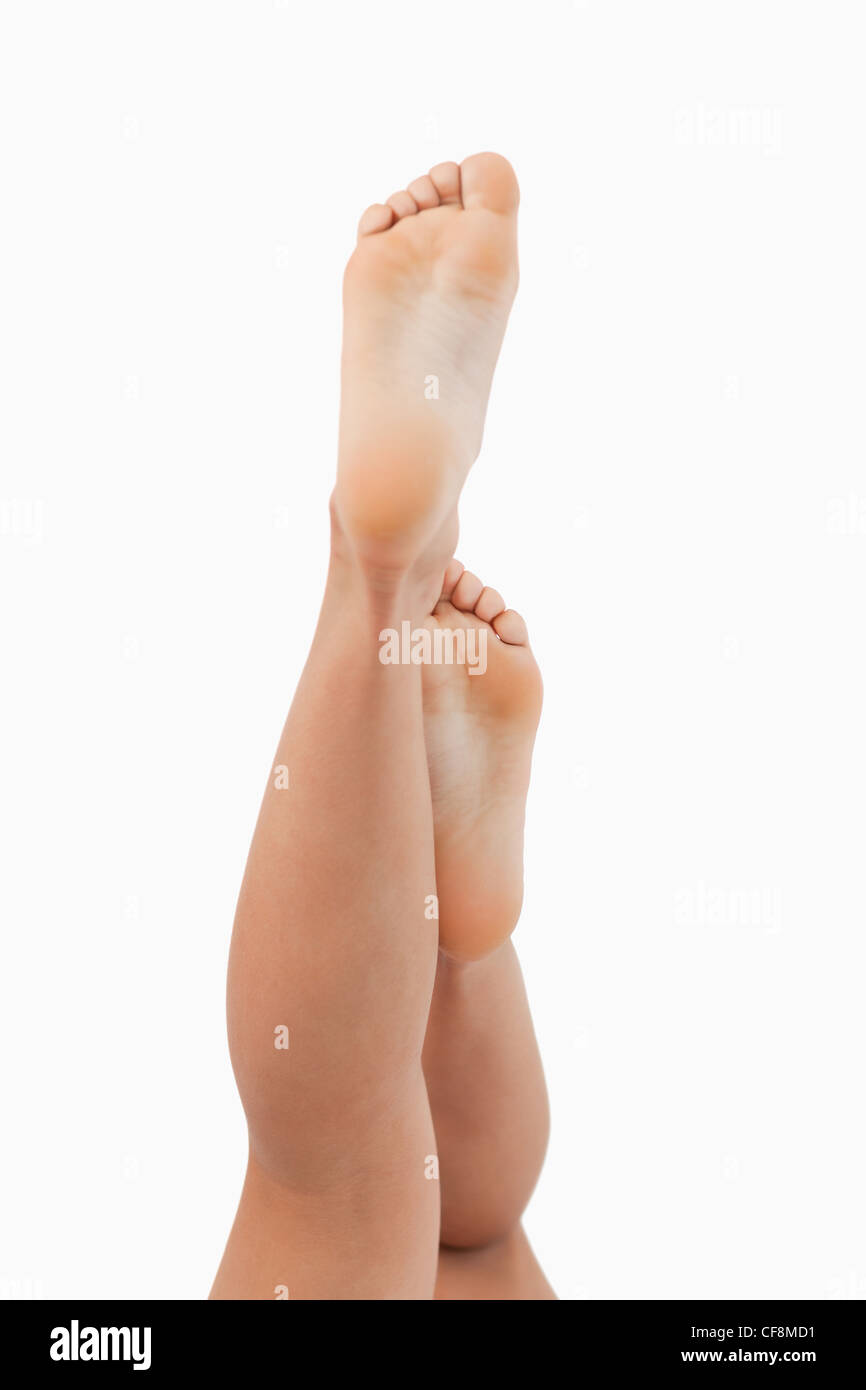 Portrait of feminine legs going up Stock Photo