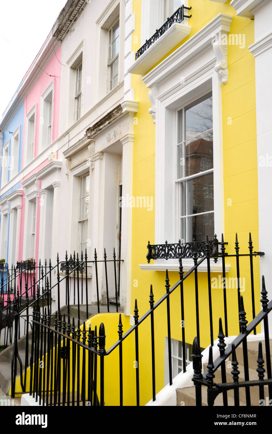 Colourful painted houses in Denbigh Terrace, Notting Hill W11, London