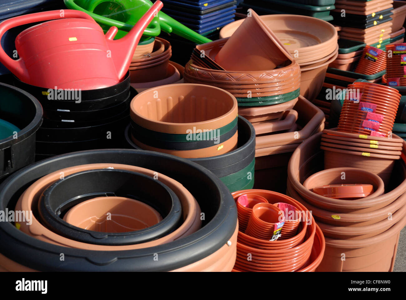 Plastic plant pots on display outside a hardware shop Stock Photo Alamy