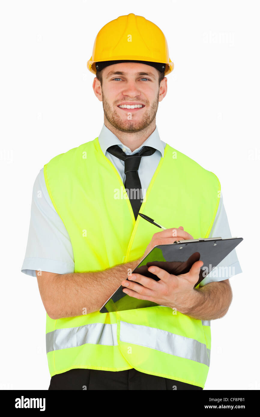 Filing Foreman Smiling young foreman with his clipboard Stock Photo - Alamy
