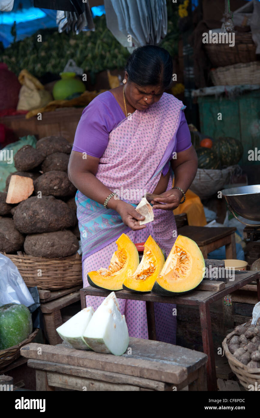Vendor selling in  market Stock Photo
