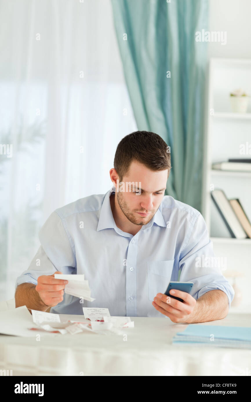 Businessman doing bookkeeping Stock Photo