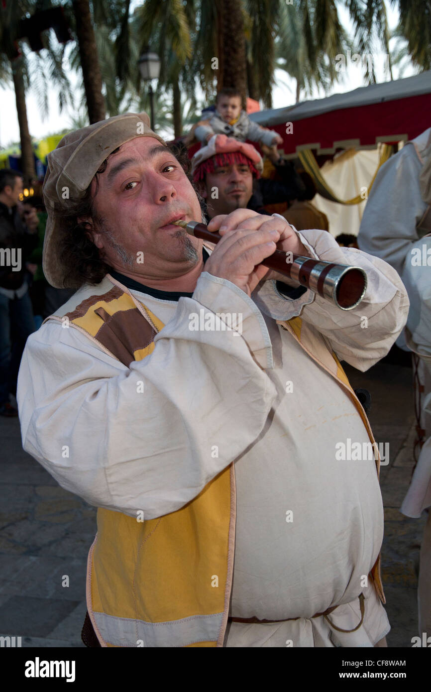 traditional costume man actor playing musical instrument at parade ...