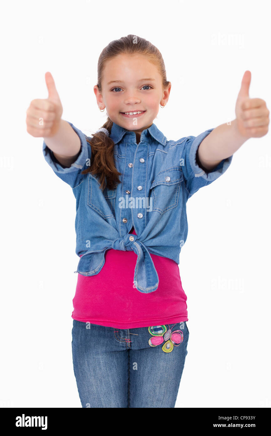 Portrait of a happy girl with the thumbs up Stock Photo - Alamy