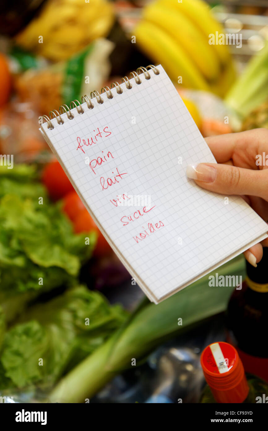 french shopping lists in a supermarket with a shopping trolley Stock Photo
