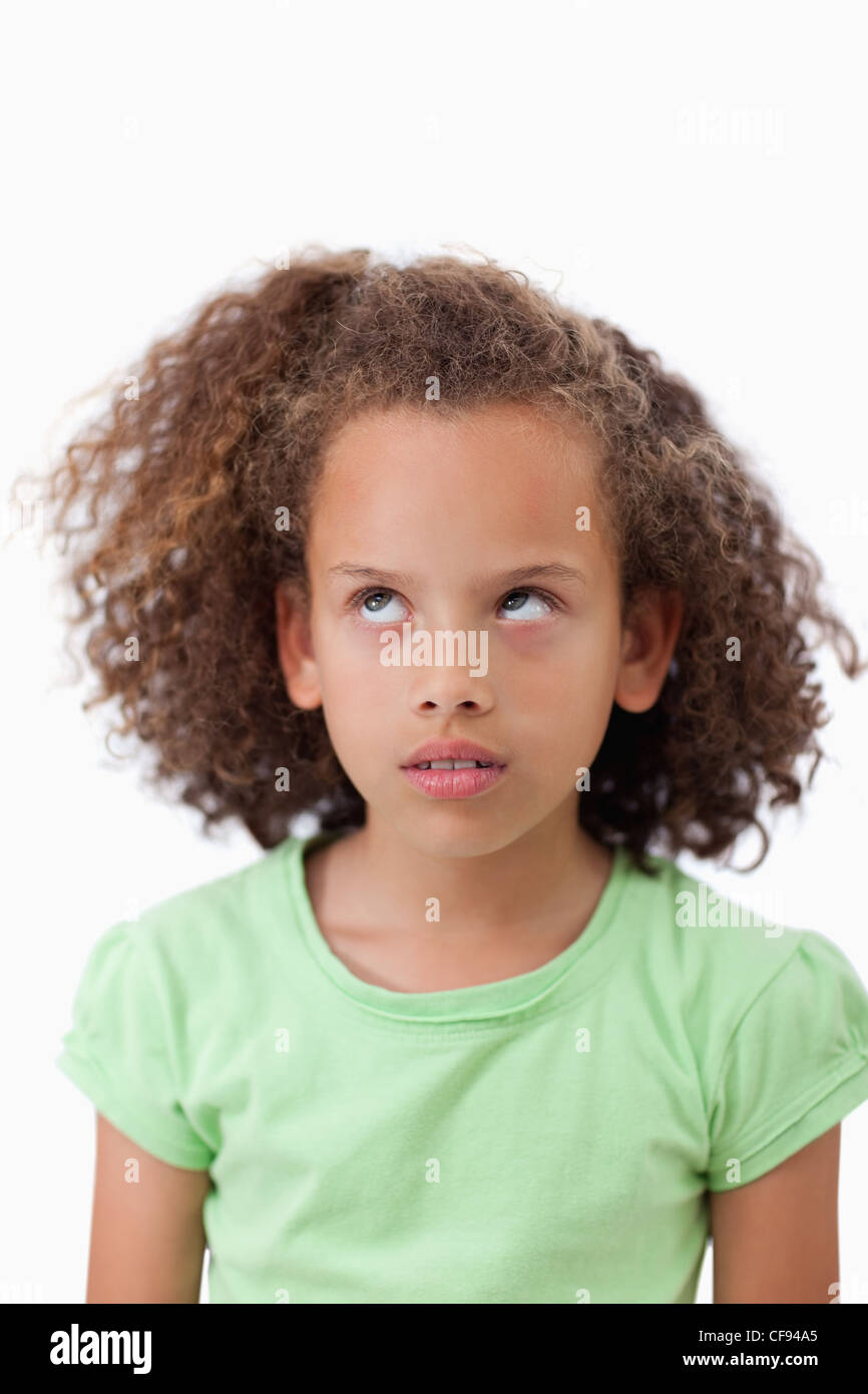 Portrait of a playful girl looking up Stock Photo - Alamy