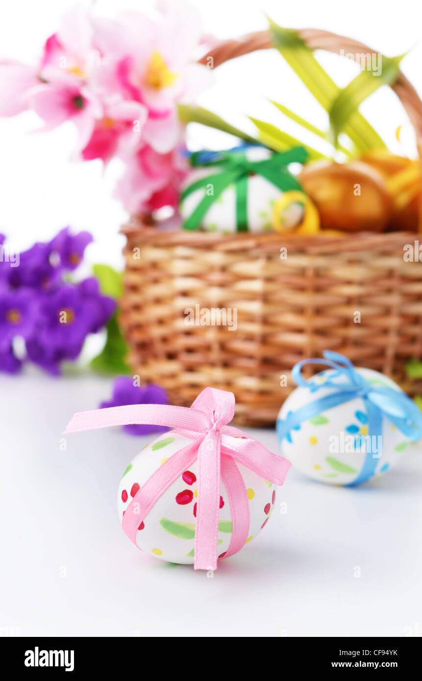 Easter eggs with bows over white background Stock Photo - Alamy