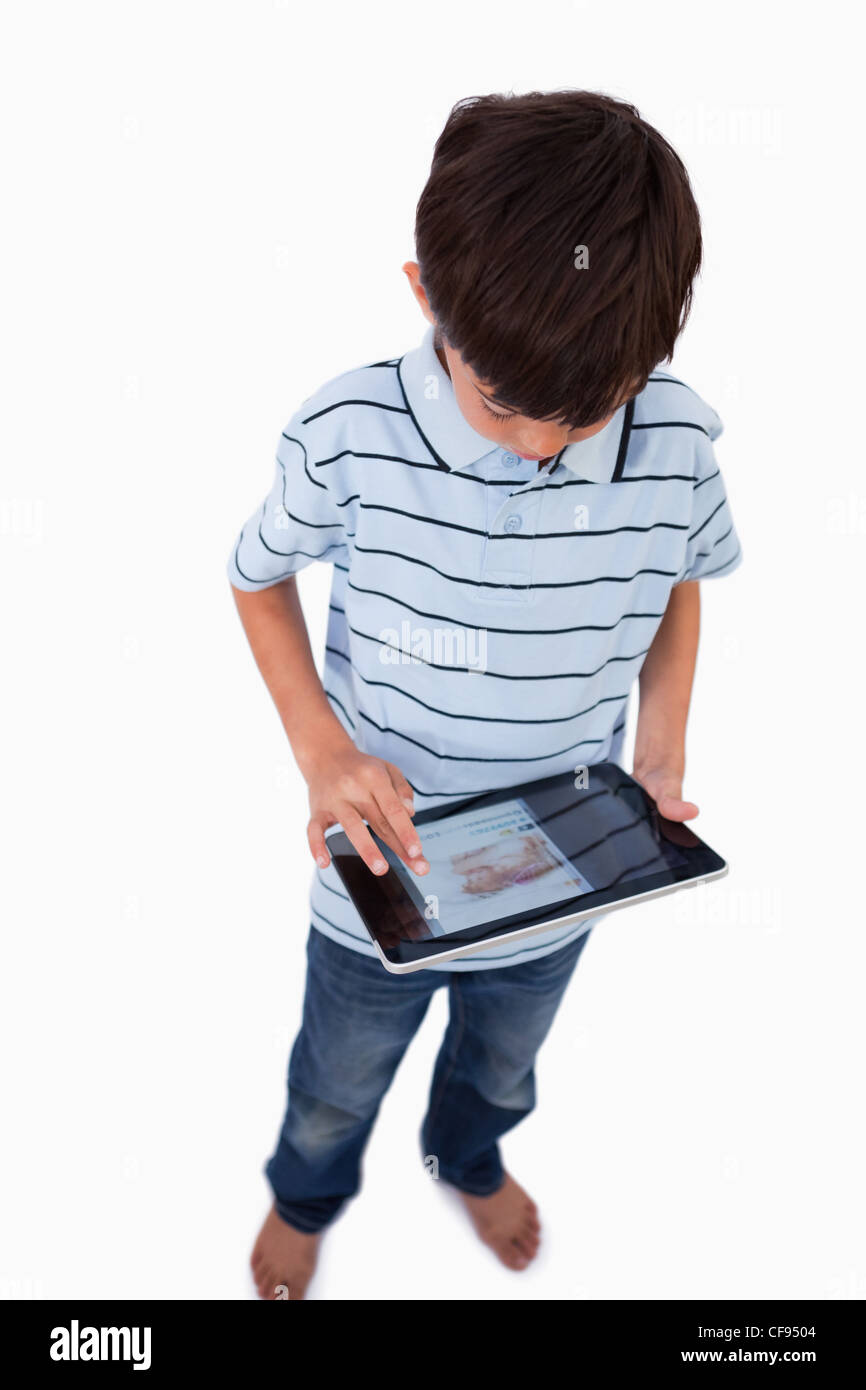 Portrait of a boy using a tablet computer Stock Photo - Alamy