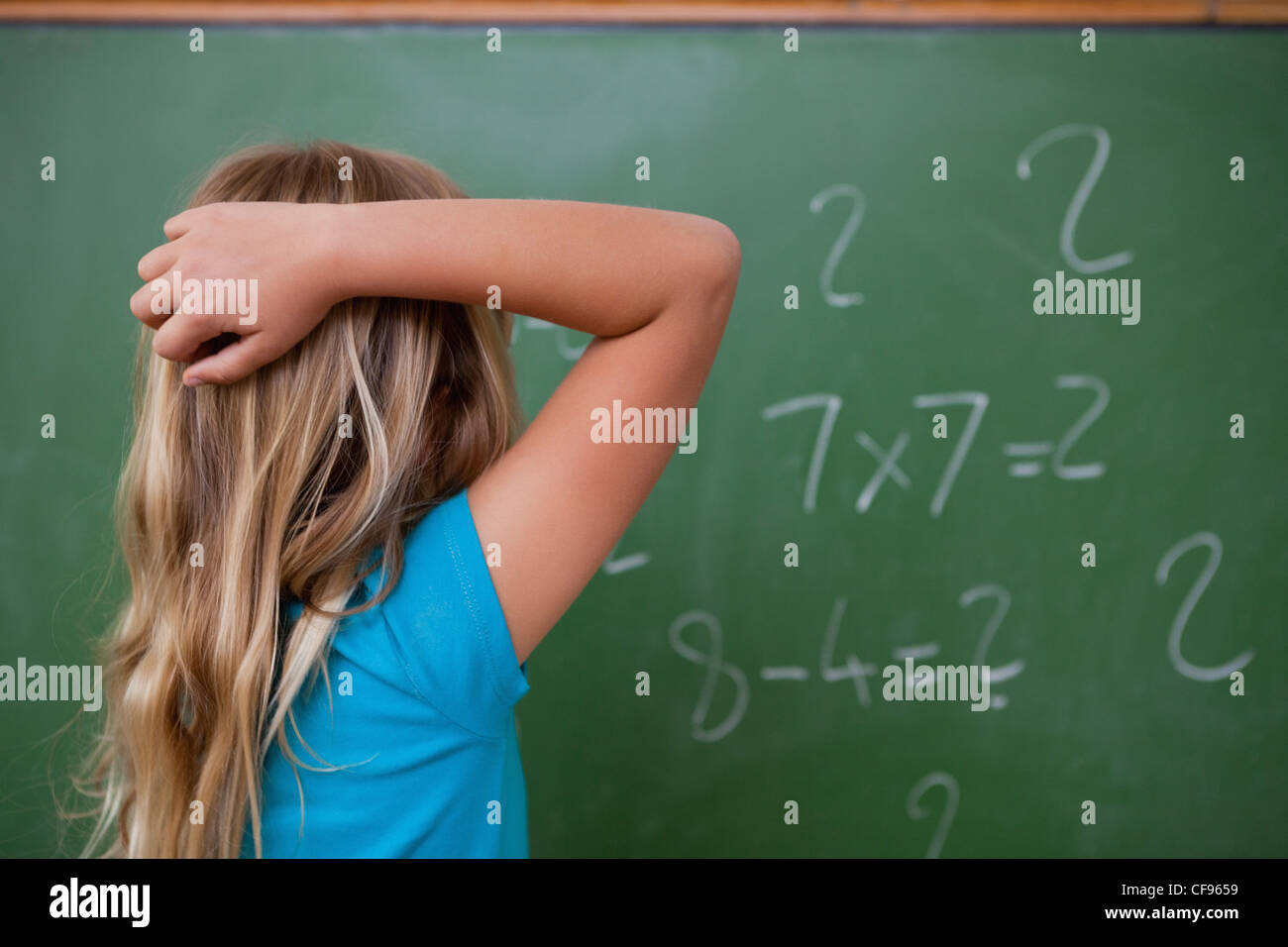 Girl scratching back hi-res stock photography and images - Alamy