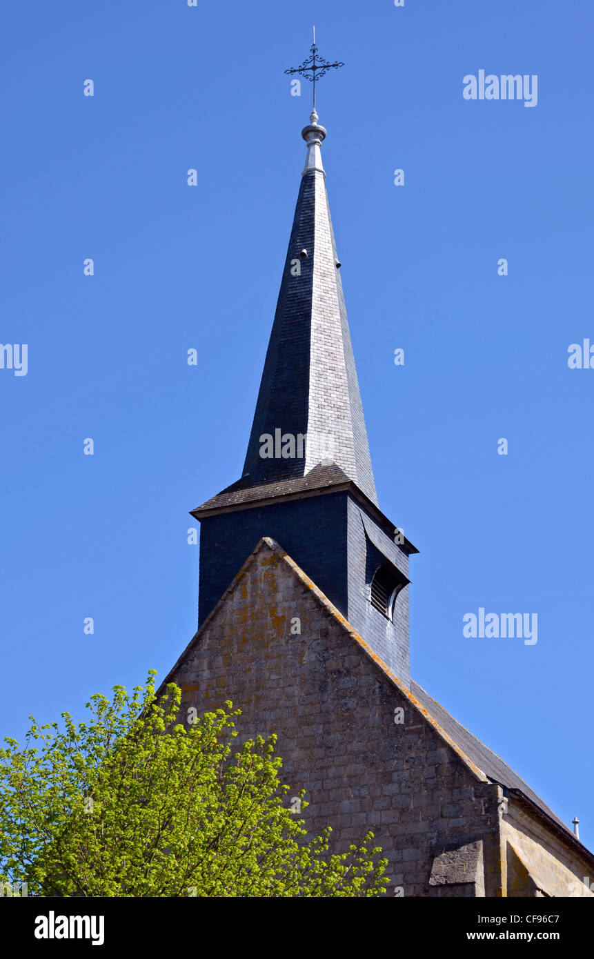 Spire of bell tower of chapel Notre-Dame-La-Blanche on the blue sky background, at Guérande in Pays de la Loire region in France Stock Photo