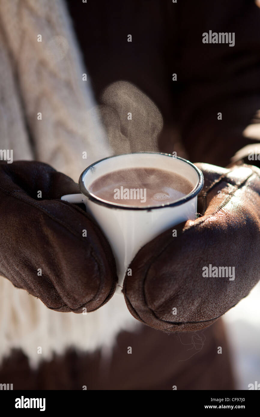 Mug and thermos of hot chocolate on a cold winter day Stock Photo - Alamy