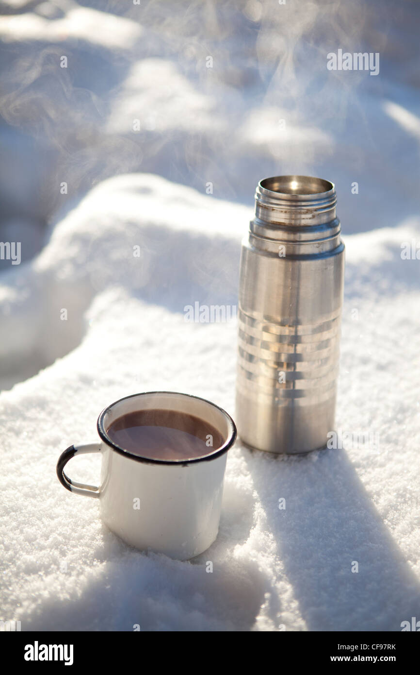 Pouring Hot Chocolate From A Thermos High-Res Stock Photo - Getty Images