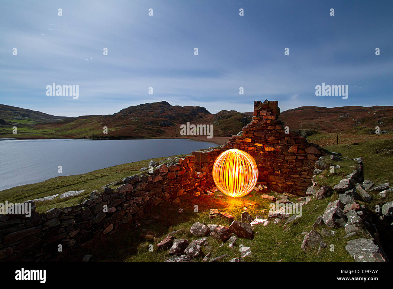 light painted orb in an old ruin Stock Photo