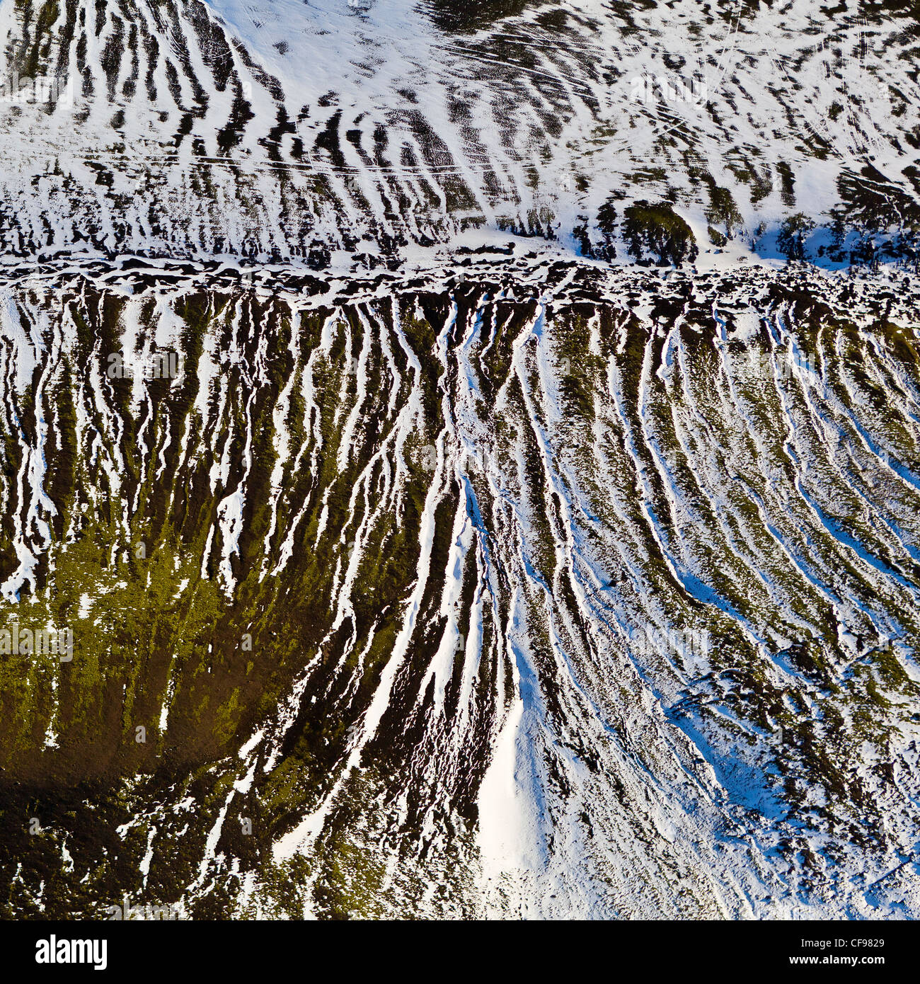 Aerial of Riverbed and light covered mountains, Iceland Stock Photo
