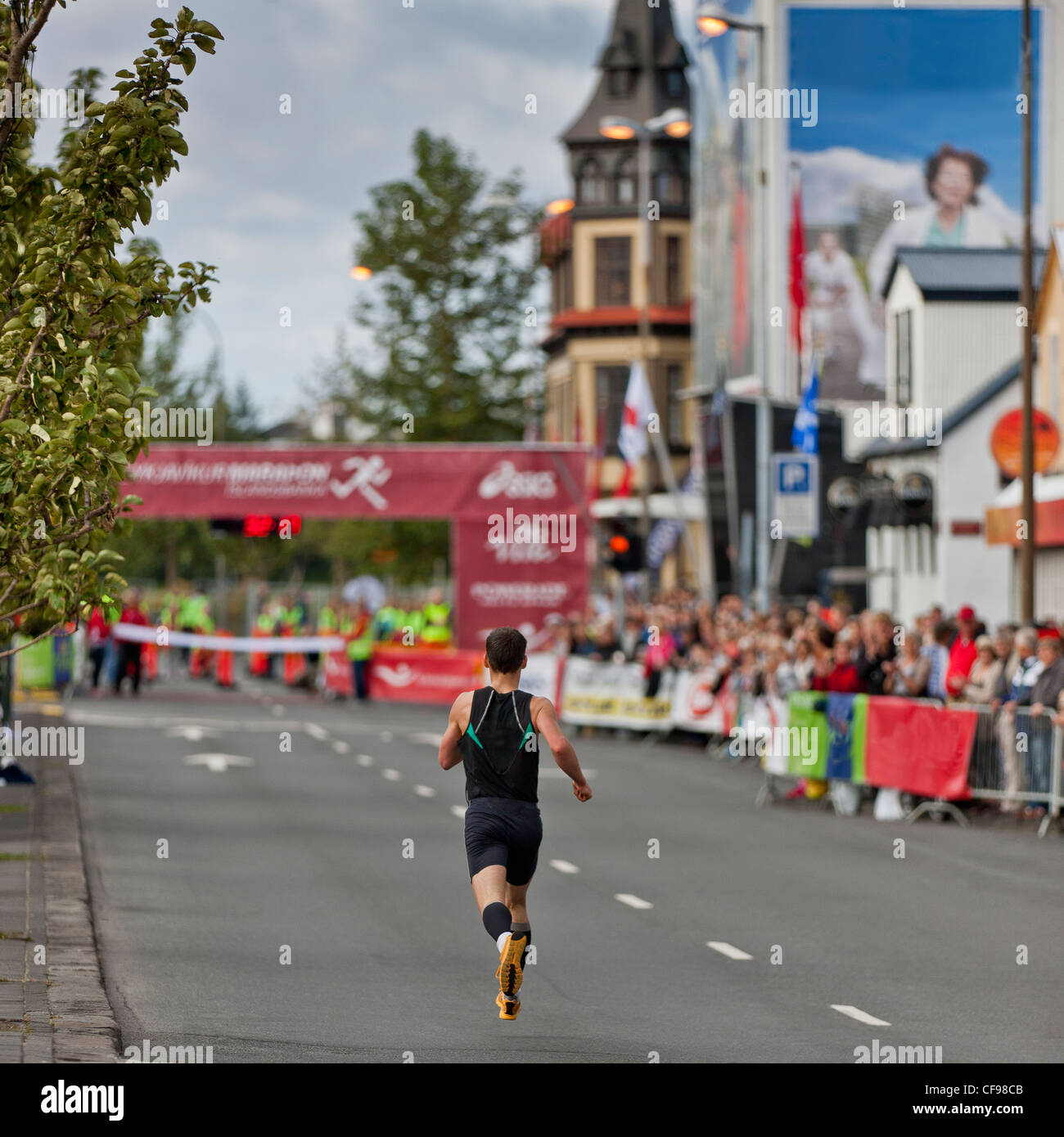 Heading for the finish line of the Reykjavik Marathon, Iceland Stock