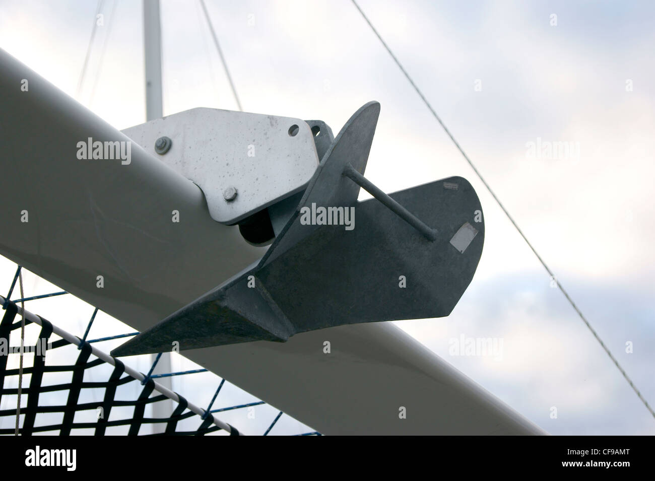 QCR anchor on the bow of a catamaran, Belfast, Maine. Stock Photo