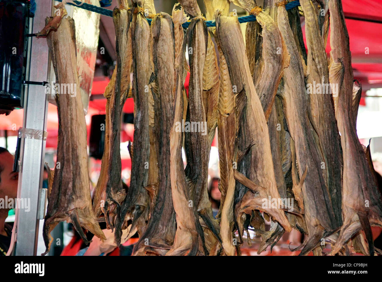 NORWAY Bergen Fish Market. Dried cod (klipfish) hanging on a fishmongers stall Stock Photo Alamy