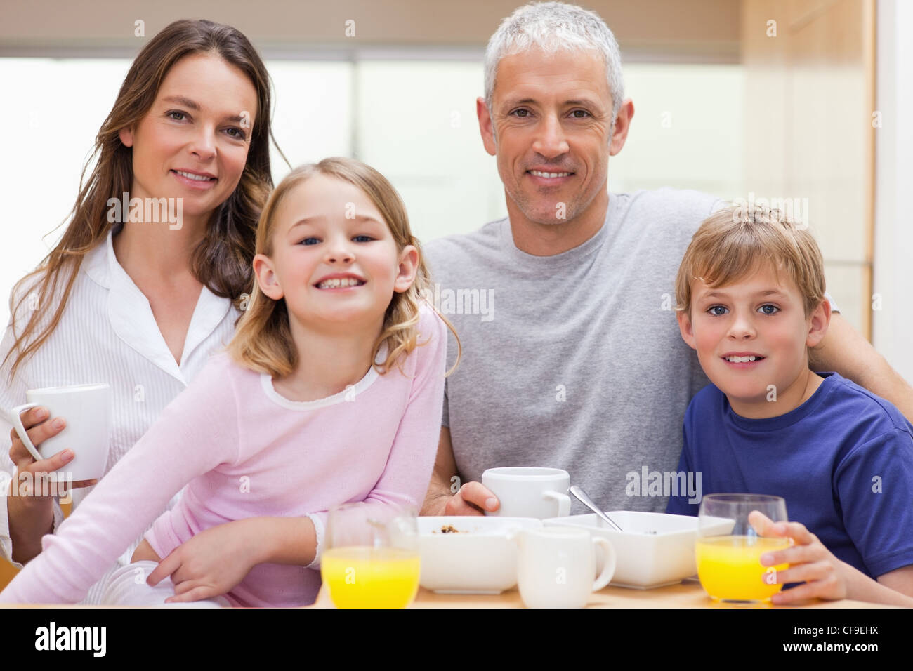 Family having breakfast Stock Photo - Alamy