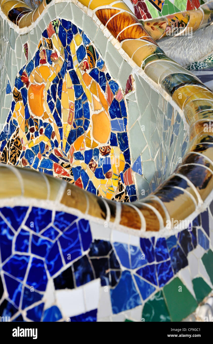 Barcelona, Spain. Park Guell (Antoni Gaudi, 1914) Bench on the Balustrade - detail of tiled mosaics Stock Photo