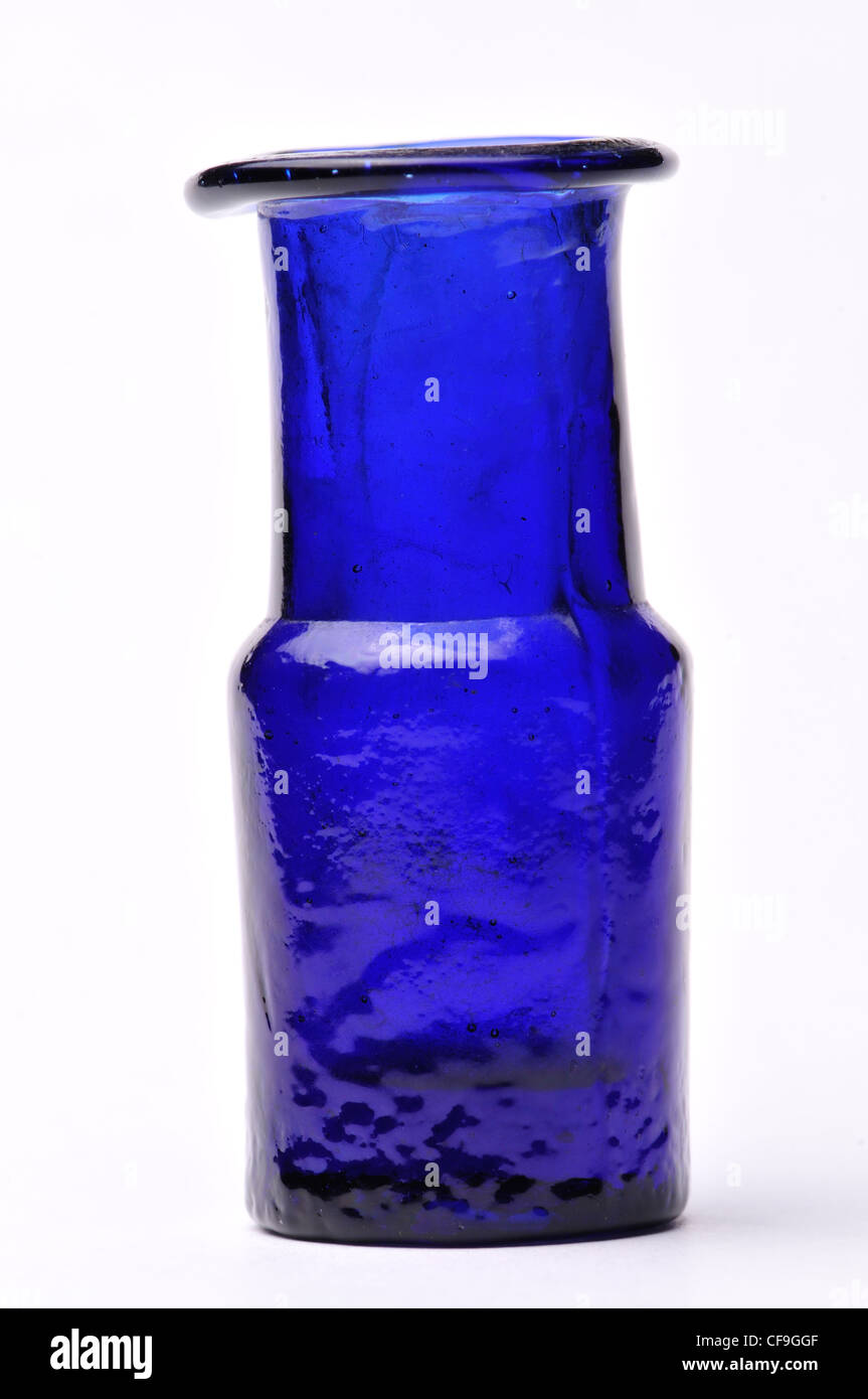 Small blue antique glass bottle (c2cm high Stock Photo Alamy