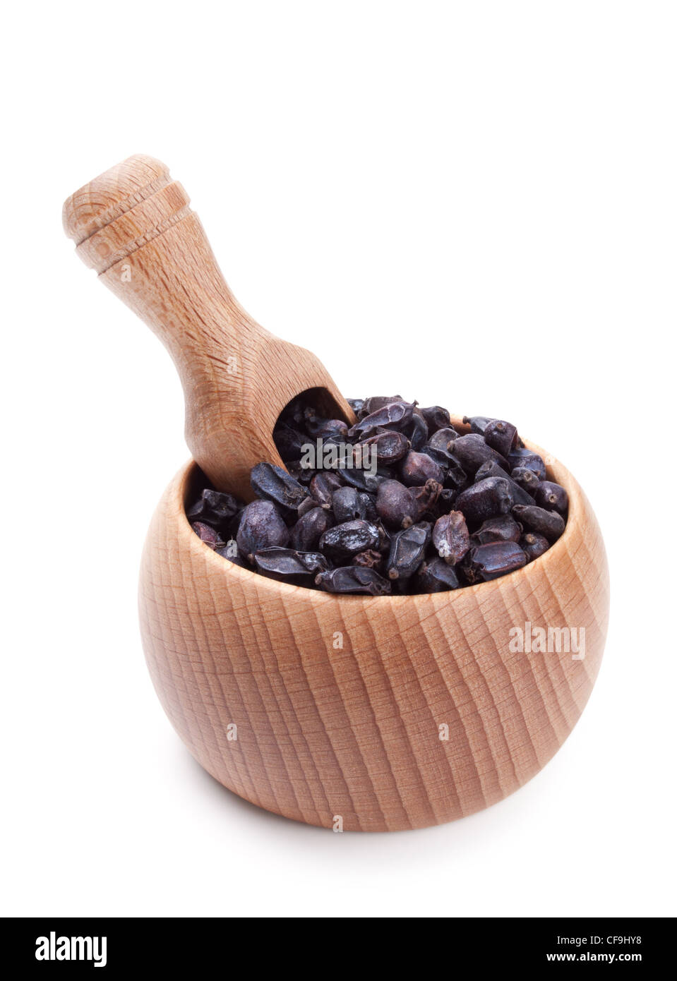 Wooden scoop in bowl full of dry barberry isolated on white background Stock Photo