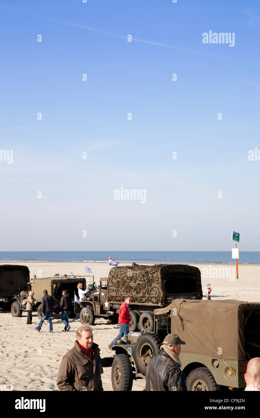 army trucks and army jeeps on beach Stock Photo
