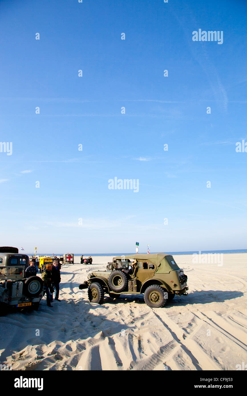 army trucks and army jeeps on beach Stock Photo