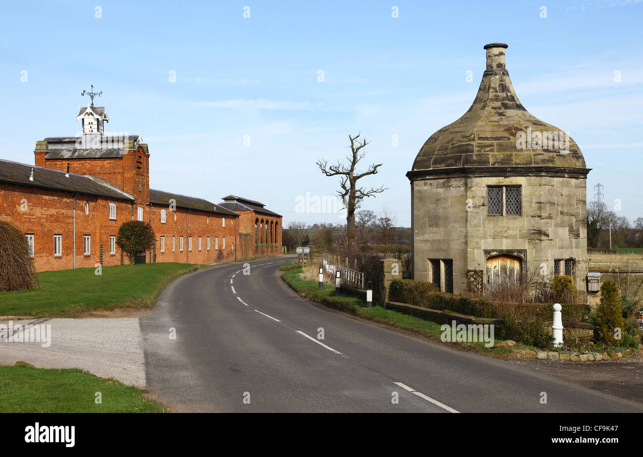 Tixall Bottle Lodge,  a curious octagonal lodge in ashlar stone with an ogee stone vaulted roof near to Stafford, England UK Stock Photo