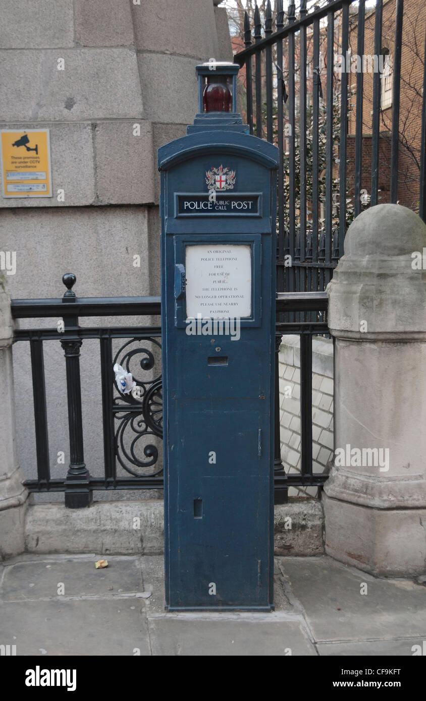 An original blue Police telephone box on St Martins Le Grand in the City of London, England. Stock Photo