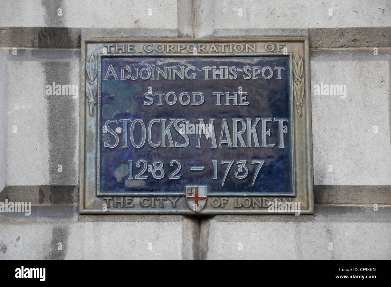 Plaque marking the spot of the original Stock Market building, 1282-1737 on Mansion House, in the City of London, England. Stock Photo
