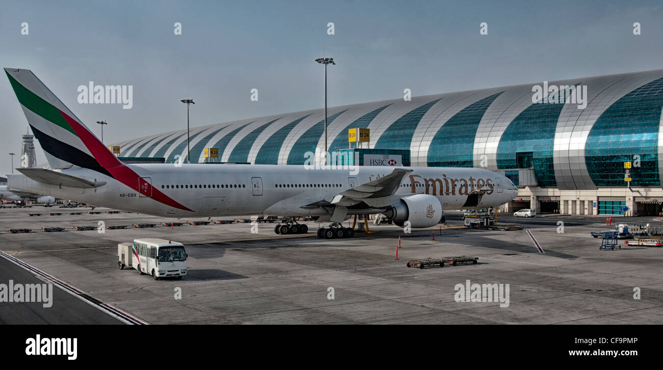 A B-777 300 at gate at Dubai airport Stock Photo