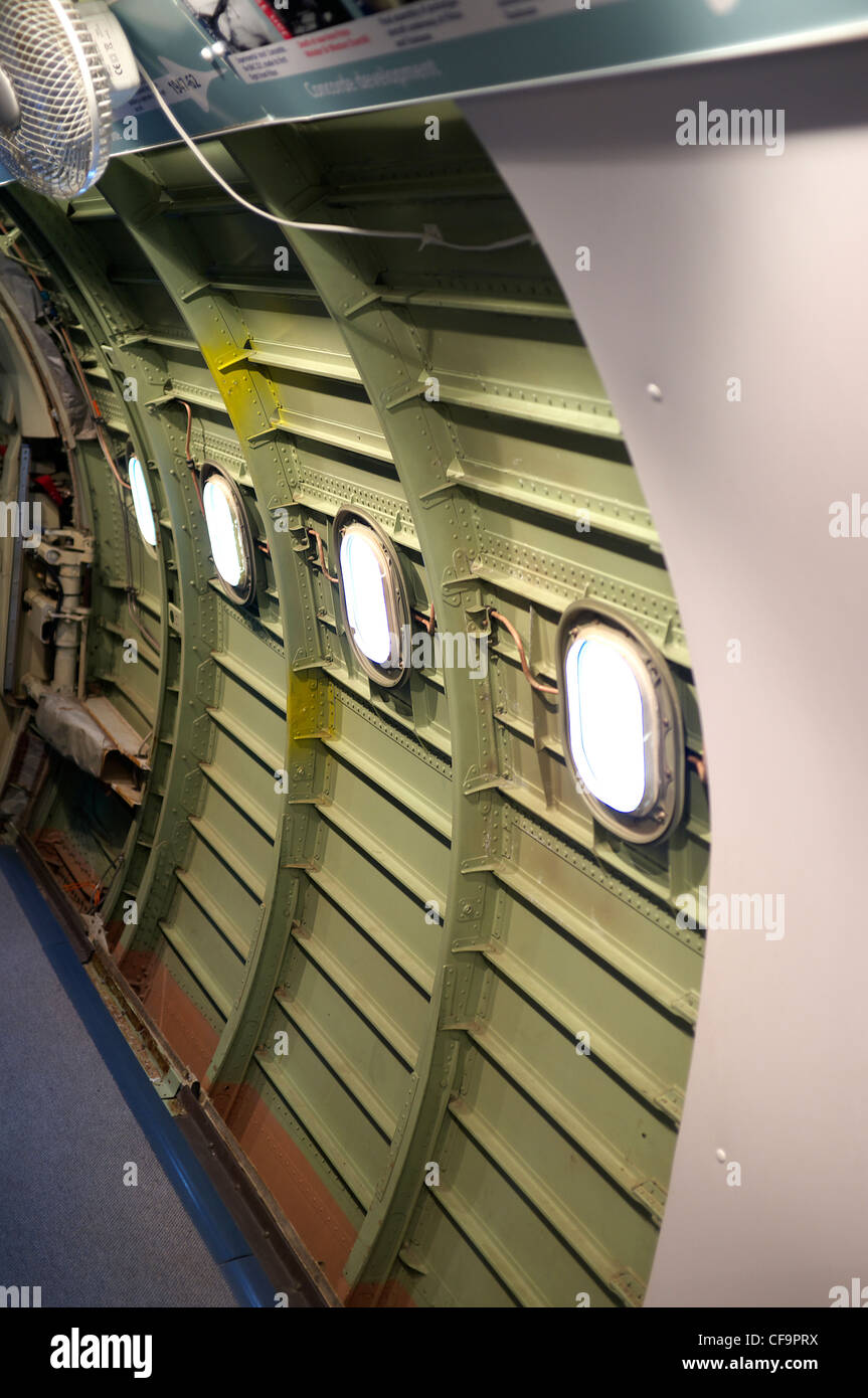 Interior sidewall with paneling removed in Concorde G-BBDG at Brooklands Museum. Stock Photo