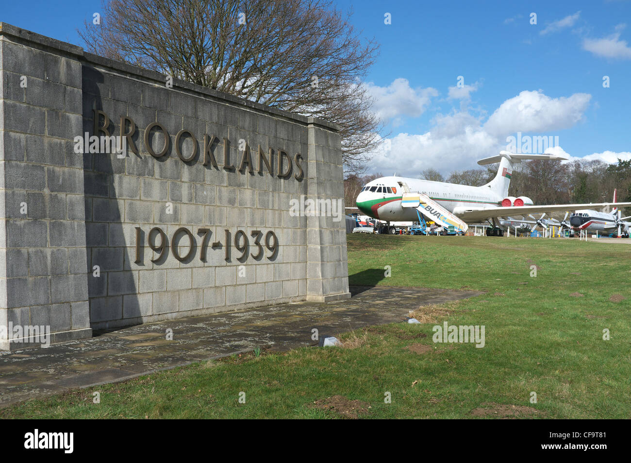 Brooklands Memorial and a VC10 airliner in the background at the Brooklands Museum. Stock Photo