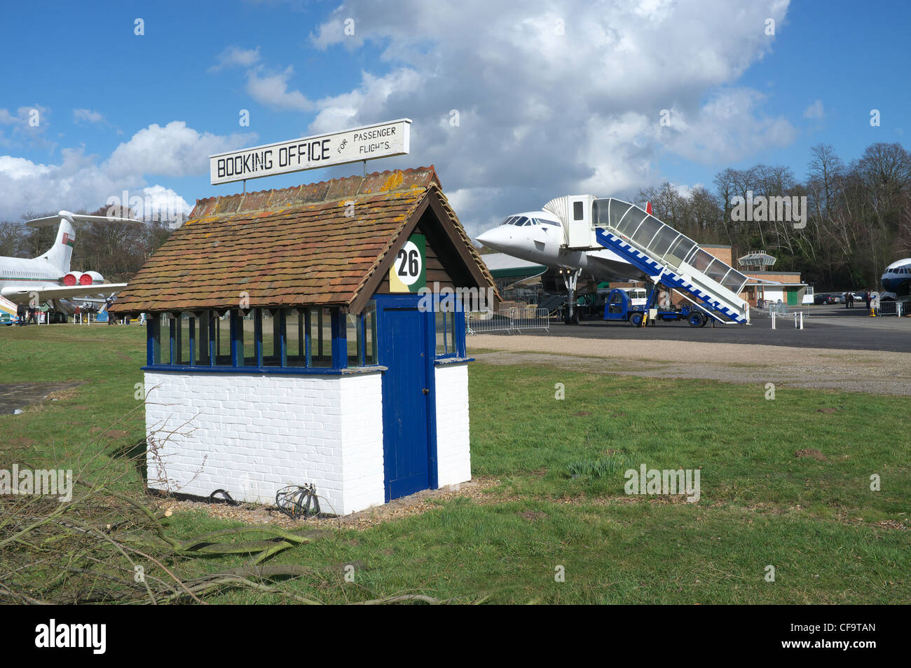 The worlds 1st Booking Office at Brooklands Museum, with Concorde G-BBDG in the background. Stock Photo