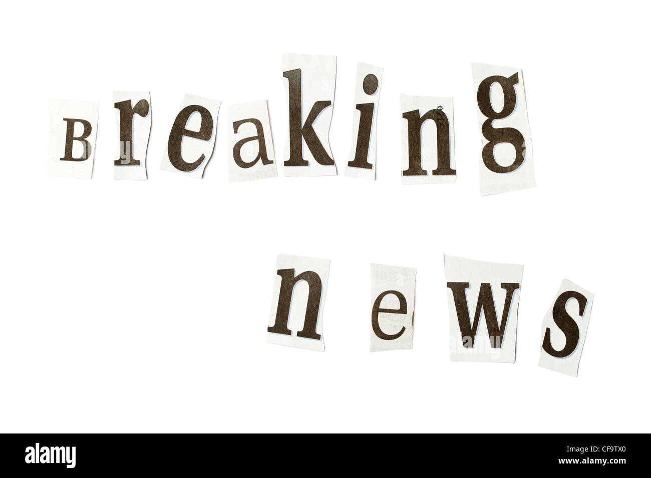 'Breaking news' text formed from cut out newsletter letters; isolated on white Stock Photo